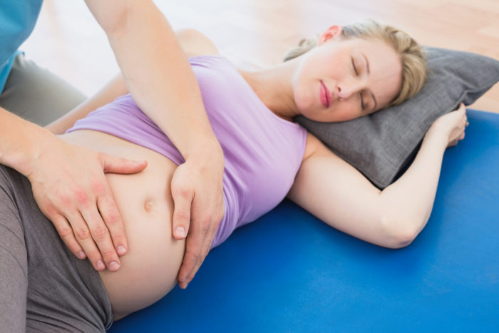 ryggmassage under graviditeten